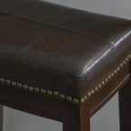 Tabouret de comptoir sans dossier en similicuir Claridge