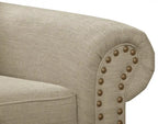 Fauteuil en tissu chenille avec garniture cloutée et pieds tournés en bois