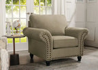 Fauteuil en tissu chenille avec garniture cloutée et pieds tournés en bois
