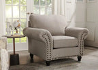 Fauteuil en tissu chenille avec garniture cloutée et pieds tournés en bois