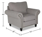 Fauteuil en tissu chenille avec garniture cloutée et pieds tournés en bois